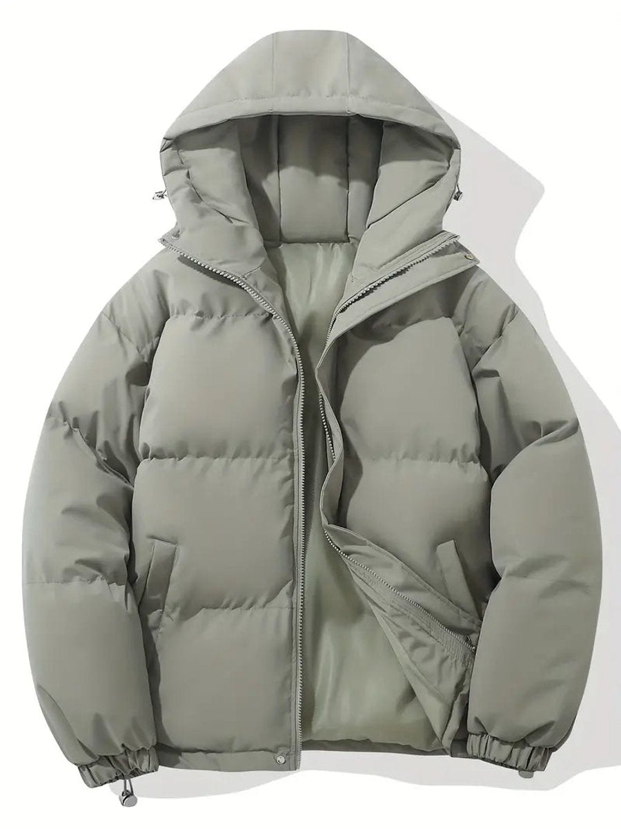 Sage green-grey hooded puffer jacket laid flat, zip partly open with elasticated cuffs 6