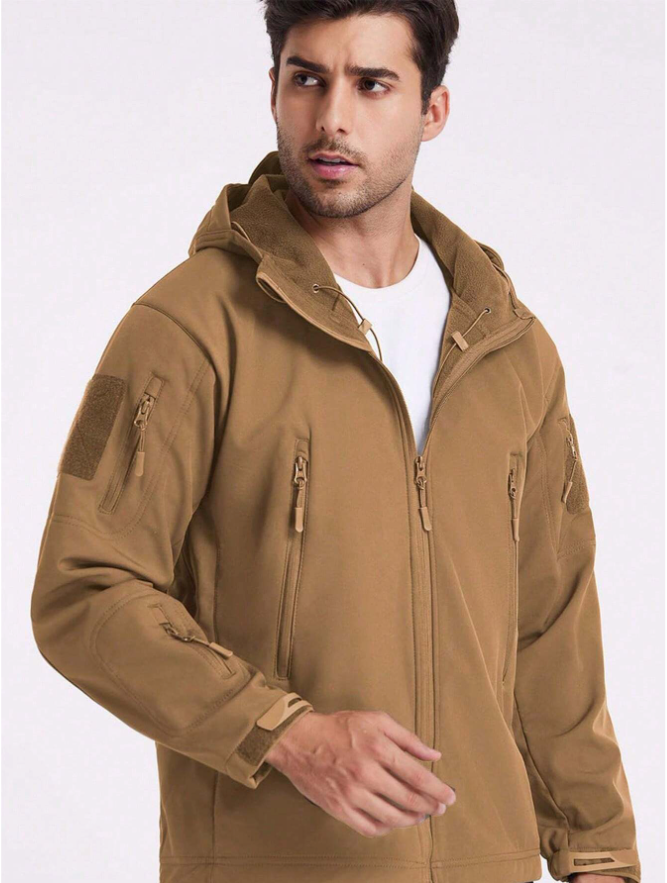 Model in the tan jacket worn open over a white T-shirt, showing the fleece-lined hood and collar, drawcords and zip pockets. 17
