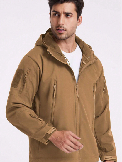 Model in the tan jacket worn open over a white T-shirt, showing the fleece-lined hood and collar, drawcords and zip pockets. 17