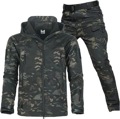 Dark camouflage hooded jacket and matching trousers with belt shown together, with a fleece-lined collar and several zipped pockets. 18