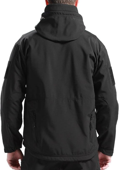 Back view of the black hooded jacket on a model, showing the stitched back panel, elbow patches and lower zip pockets. 3