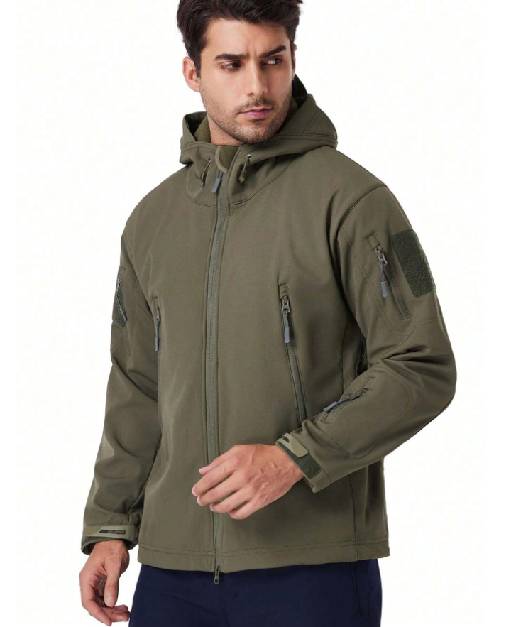 Model in the olive green hooded jacket, turned slightly sideways, showing the front zip, chest pockets and sleeve patch. 4